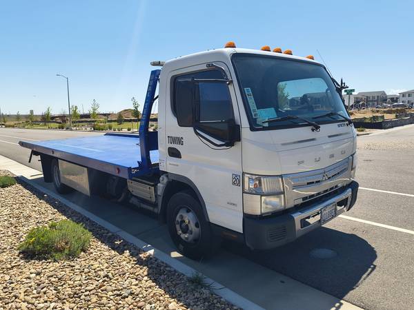 2015 Mitsubishi Fuso Canter 180 tow truck