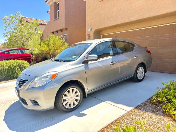 2015 Nissan versa SE pureDrive 140k org miles runs like new no issues